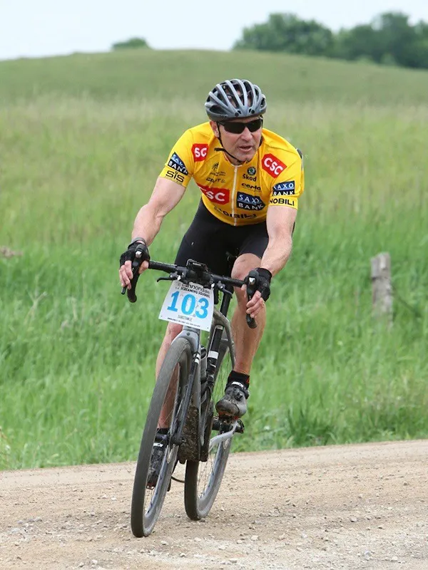 Dr. Skalenda competing in a gravel cycling race
